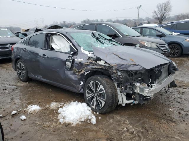 Photo 4 from auction – 2018 HONDA CIVIC EX with VIN 19XFC1F3XJE201616