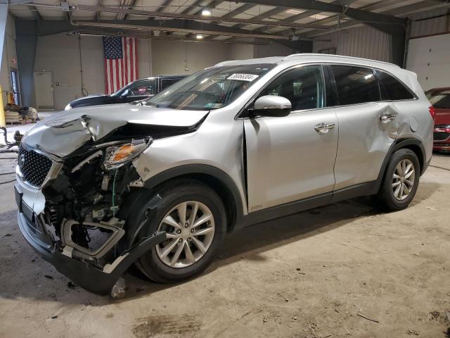KIA SORENTO LX 2016 with VIN 5XYPGDA39GG024974 - Photo from auction