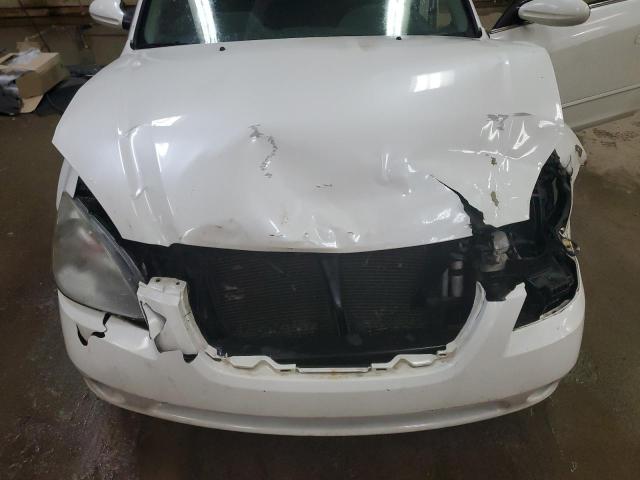 Photo 11 from auction – 2002 NISSAN ALTIMA BAS with VIN 1N4AL11D92C272377