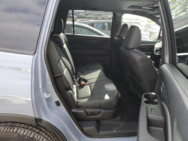 Photo 11 from auction – 2023 HONDA PASSPORT E with VIN 5FNYF8H58PB035042