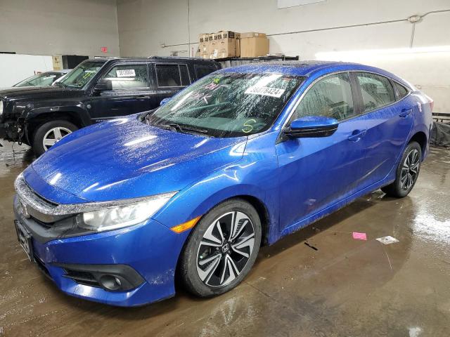 HONDA CIVIC EX 2017 with VIN 19XFC1F38HE001814 - Photo from auction