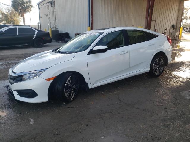 HONDA CIVIC EX 2018 with VIN JHMFC1F31JX008690 - Photo from auction