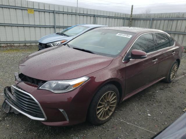 TOYOTA AVALON HYB 2018 with VIN 4T1BD1EB7JU064667 - Photo from auction