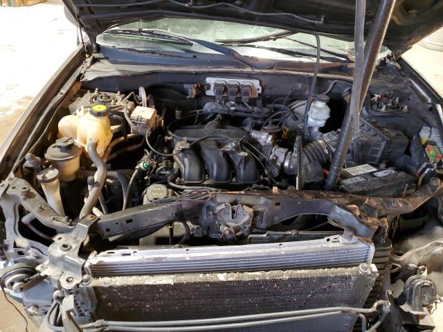 Photo 12 from auction – 2005 FORD ESCAPE LIM with VIN 1FMYU04175KB75959