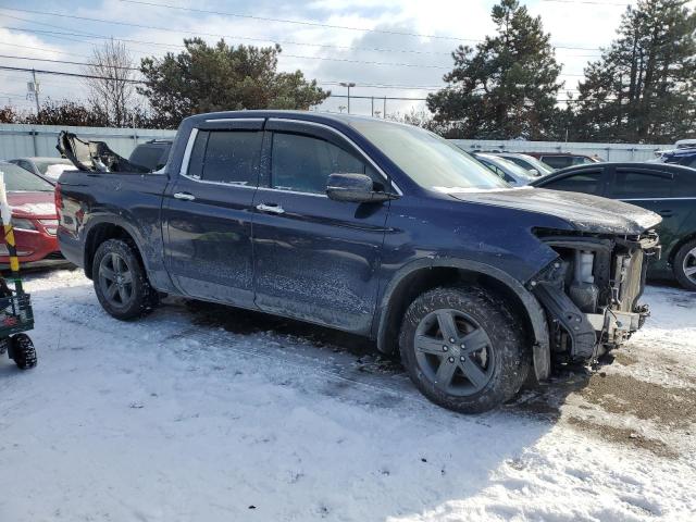 Photo 4 from auction – 2022 HONDA RIDGELINE with VIN 5FPYK3F74NB013532