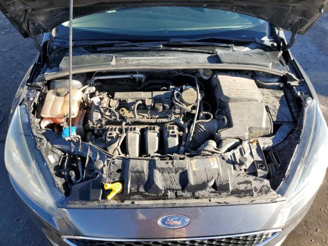 Photo 11 from auction – 2016 FORD FOCUS SE with VIN 1FADP3F20GL295154