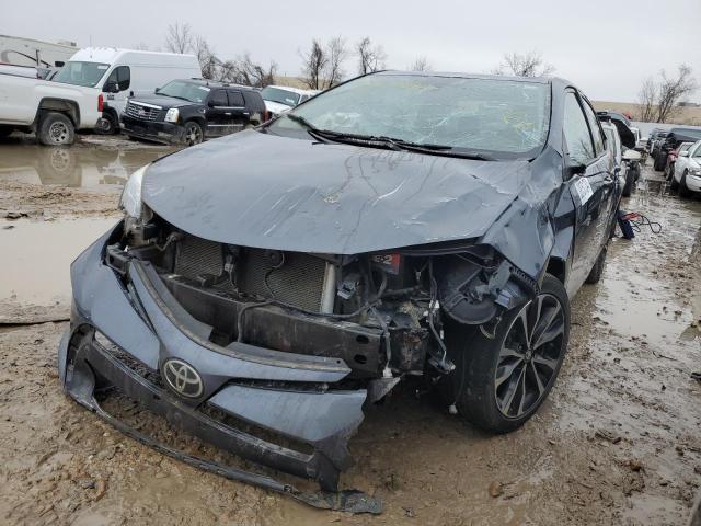 TOYOTA COROLLA L 2017 with VIN 5YFBURHE7HP698397 - Photo from auction