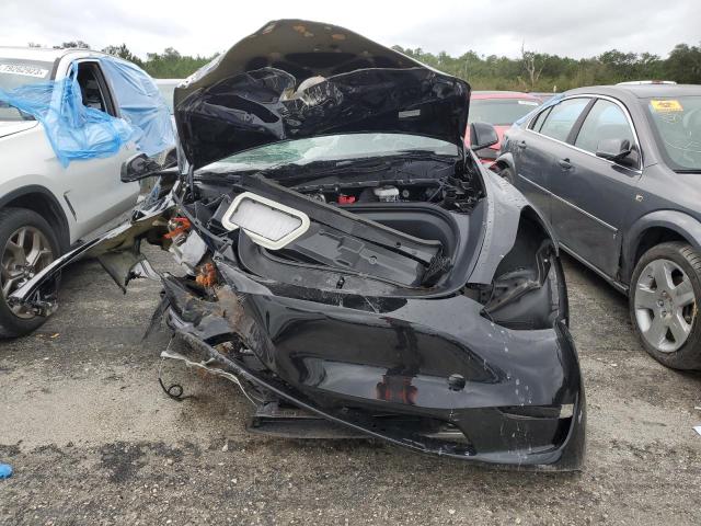 Photo 5 from auction – 2023 TESLA MODEL Y with VIN 7SAYGDEE1PA087123