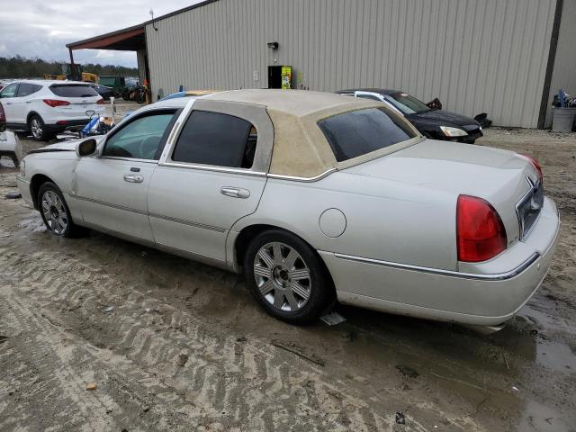 Photo 2 from auction – 2004 LINCOLN TOWN CAR U with VIN 1LNHM83W24Y677950