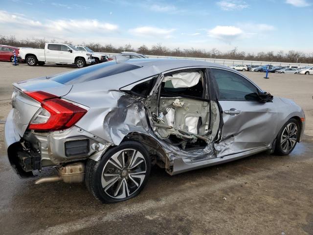 Photo 3 from auction – 2018 HONDA CIVIC EX with VIN 19XFC1F32JE201433