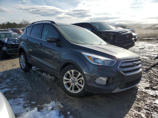 Photo 4 from auction – 2018 FORD ESCAPE SE with VIN 1FMCU9GD0JUB53594
