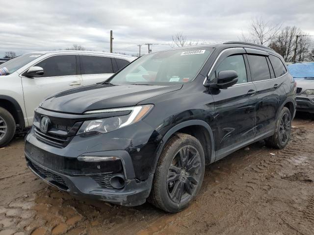 HONDA PILOT SE 2021 with VIN 5FNYF6H26MB029634 - Photo from auction
