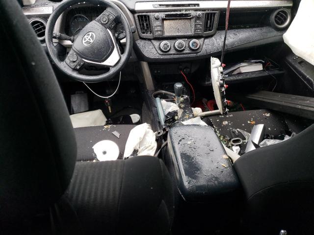 Photo 8 from auction – 2018 TOYOTA RAV4 LE with VIN JTMZFREV2JJ164358