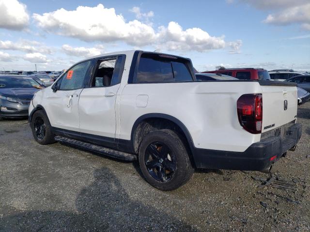 Photo 2 from auction – 2023 HONDA RIDGELINE with VIN 5FPYK3F80PB001356