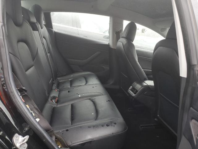 Photo 10 from auction – 2018 TESLA MODEL 3 with VIN 5YJ3E1EB6JF068272