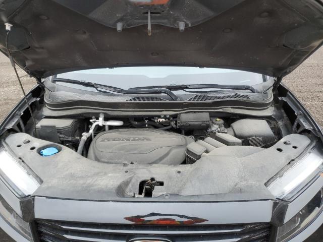 Photo 11 from auction – 2022 HONDA RIDGELINE with VIN 5FPYK3F82NB503248