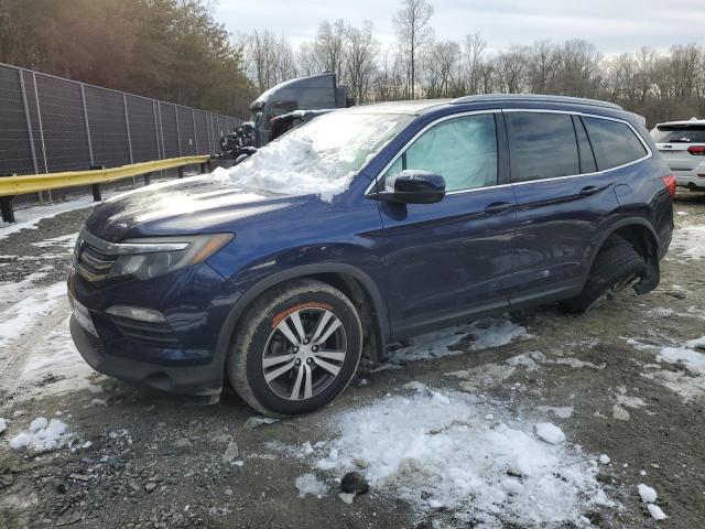 HONDA PILOT EXL 2016 with VIN 5FNYF6H59GB041100 - Photo from auction