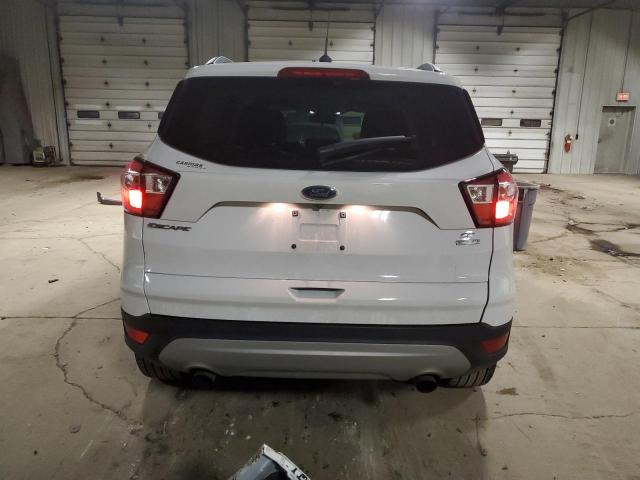 Photo 6 from auction – 2018 FORD ESCAPE SE with VIN 1FMCU0GD8JUD02815
