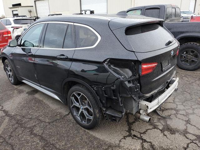 Photo 2 from auction – 2017 BMW X1 XDRIVE2 with VIN WBXHT3C31H5F72202