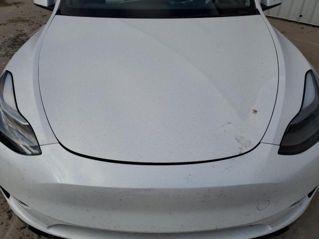 Photo 11 from auction – 2023 TESLA MODEL Y with VIN 7SAYGDEE4PF633335