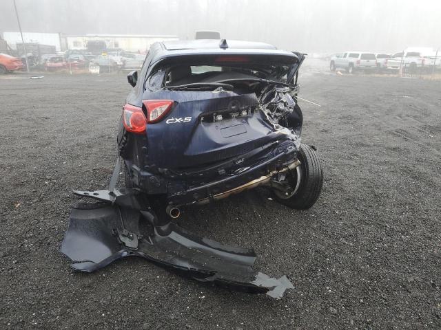 Photo 6 from auction – 2014 MAZDA CX-5 SPORT with VIN JM3KE2BE1E0370113