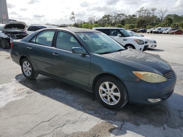 Photo 4 from auction – 2002 TOYOTA CAMRY LE with VIN JTDBE32K820078037
