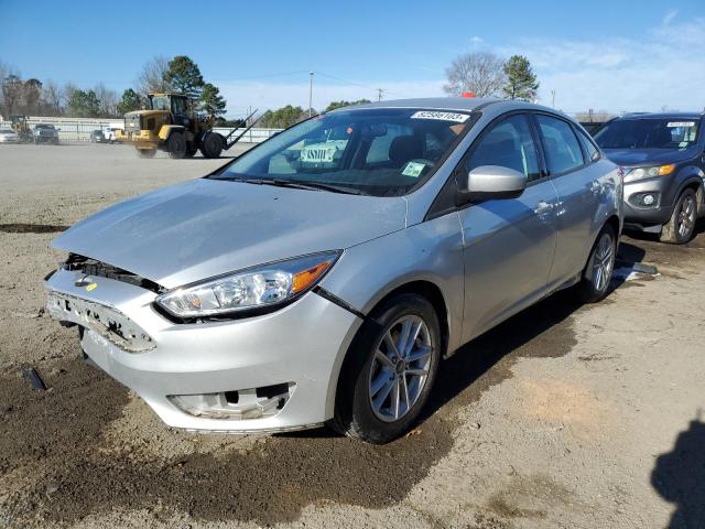 FORD FOCUS SE 2018 with VIN 1FADP3F24JL299375 - Photo from auction
