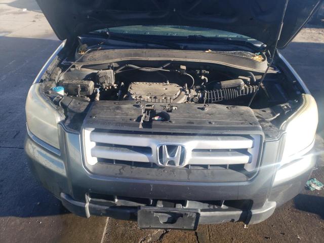 Photo 12 from auction – 2006 HONDA PILOT EX with VIN 5FNYF18766B021907
