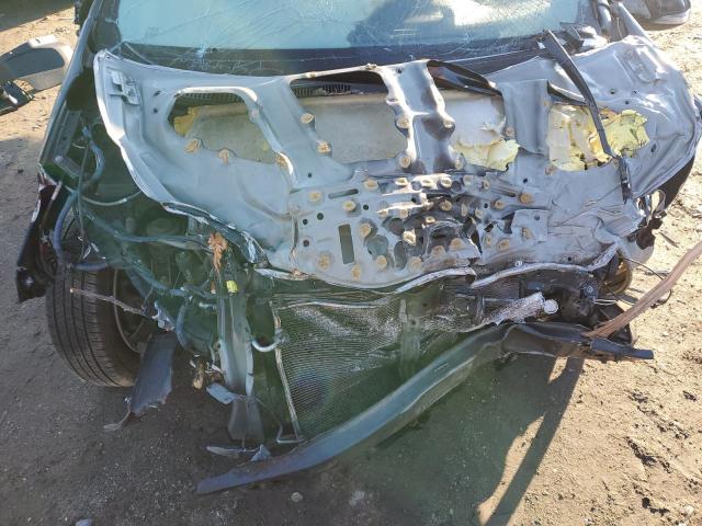Photo 11 from auction – 2013 TOYOTA PRIUS C with VIN JTDKDTB3XD1536346