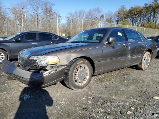 LINCOLN TOWN CAR E 2004 with VIN 1LNHM81W34Y674090 - Photo from auction