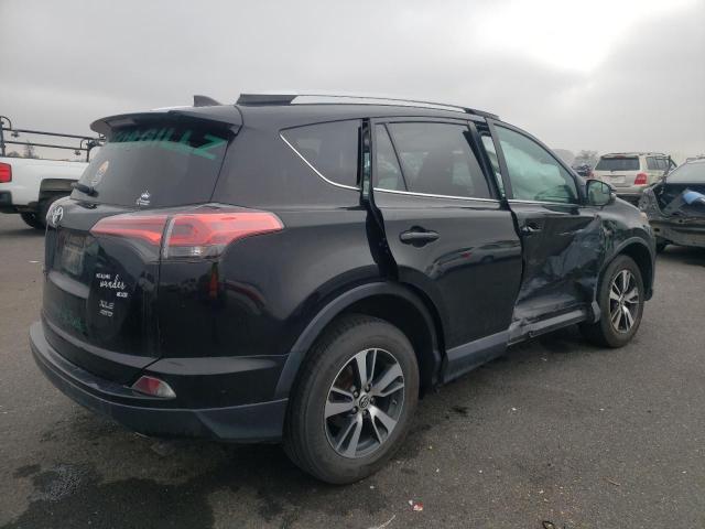 Photo 3 from auction – 2016 TOYOTA RAV4 XLE with VIN 2T3RFREV6GW467413