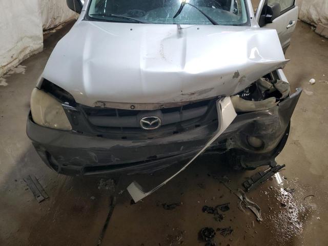 Photo 12 from auction – 2003 MAZDA TRIBUTE LX with VIN 4F2YZ04113KM46582