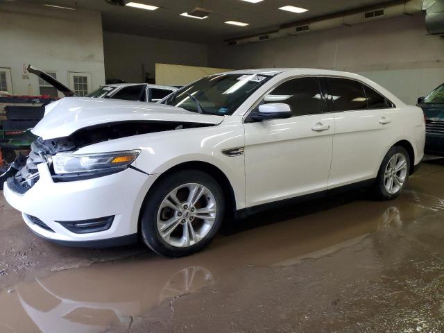 FORD TAURUS SEL 2016 with VIN 1FAHP2E84GG102384 - Photo from auction