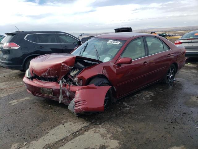 TOYOTA CAMRY LE 2002 with VIN 4T1BE30K82U581509 - Photo from auction