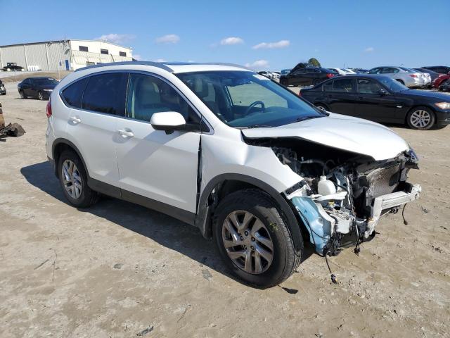 Photo 4 from auction – 2016 HONDA CR-V EXL with VIN 5J6RM4H72GL112256