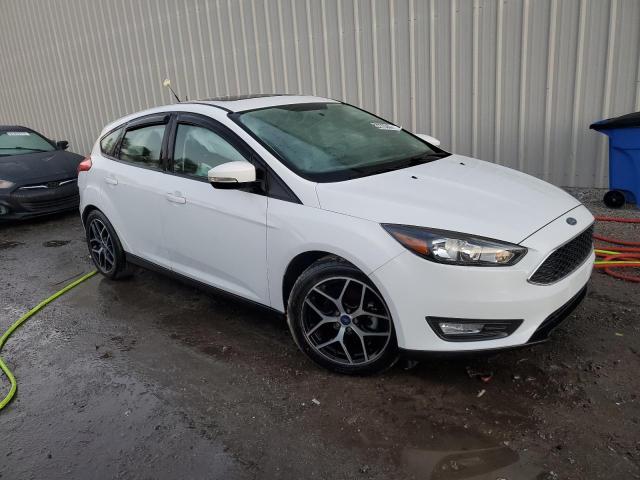 Foto 4 de la subasta – 2017 FORD FOCUS SEL con VIN 1FADP3M23HL317121