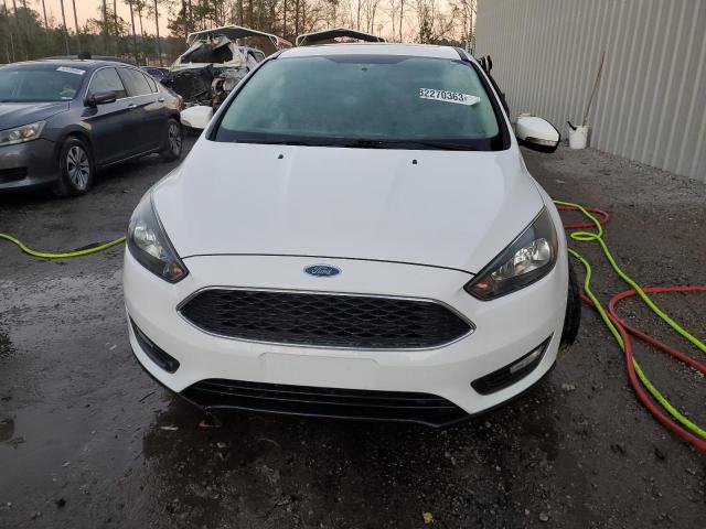 Foto 5 de la subasta – 2017 FORD FOCUS SEL con VIN 1FADP3M23HL317121