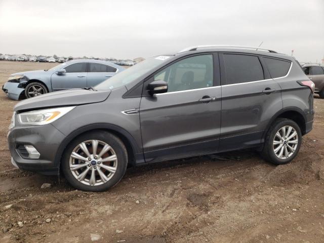 FORD ESCAPE TIT 2017 with VIN 1FMCU0J93HUE01573 - Photo from auction