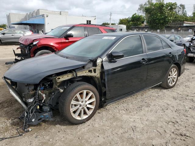 Photo 1 from auction – 2014 TOYOTA CAMRY L with VIN 4T4BF1FKXER408352