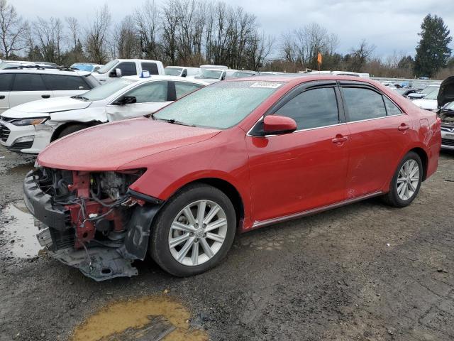TOYOTA CAMRY HYBR 2012 with VIN 4T1BD1FK1CU063077 - Photo from auction