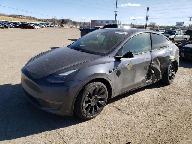 TESLA MODEL Y 2023 with VIN 7SAYGDEE8PF893592 - Photo from auction
