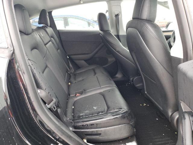 Photo 10 from auction – 2023 TESLA MODEL Y with VIN 7SAYGAEE3PF668673