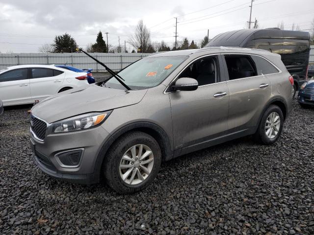 KIA SORENTO LX 2016 with VIN 5XYPGDA38GG101690 - Photo from auction