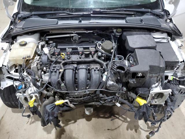 Photo 11 from auction – 2014 FORD FOCUS SE with VIN 1FADP3F29EL173860