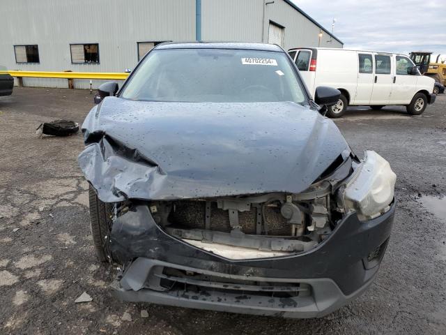 Photo 5 from auction – 2014 MAZDA CX-5 SPORT with VIN JM3KE2BE4E0357713