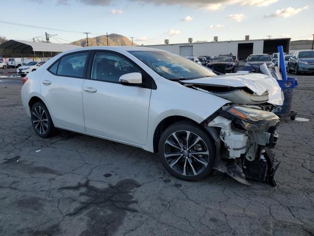 Photo 4 from auction – 2018 TOYOTA COROLLA L with VIN 5YFBURHE4JP763180
