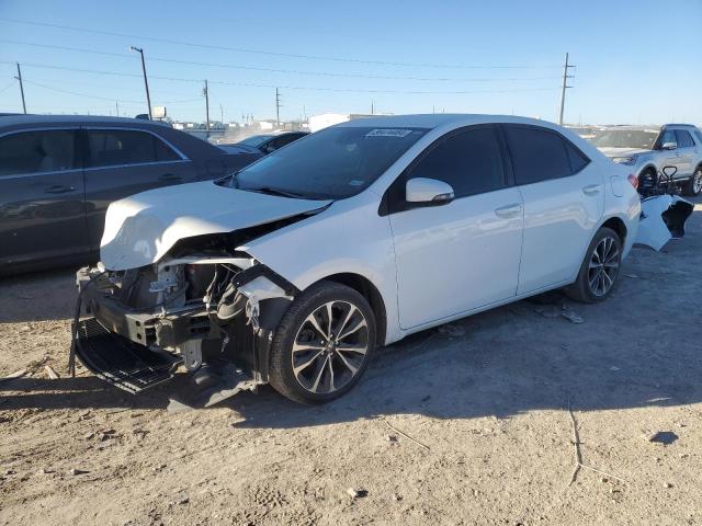 TOYOTA COROLLA L 2019 with VIN 5YFBURHE9KP868167 - Photo from auction