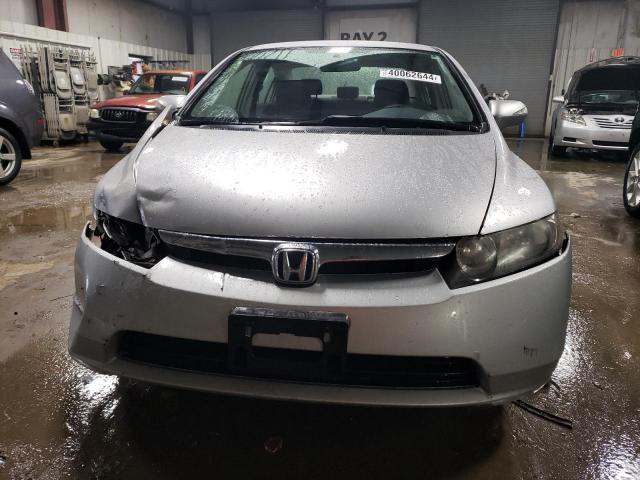 Photo 5 from auction – 2007 HONDA CIVIC HYBR with VIN JHMFA36277S002097