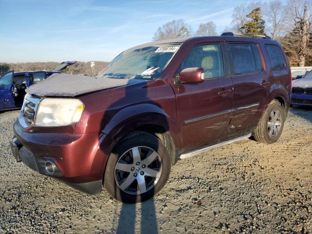 HONDA PILOT TOUR 2014 with VIN 5FNYF4H98EB008738 - Photo from auction