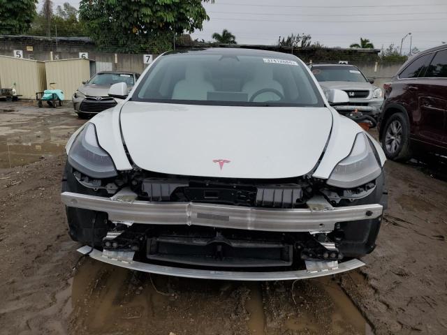Photo 5 from auction – 2022 TESLA MODEL 3 with VIN 5YJ3E1EA2NF326753